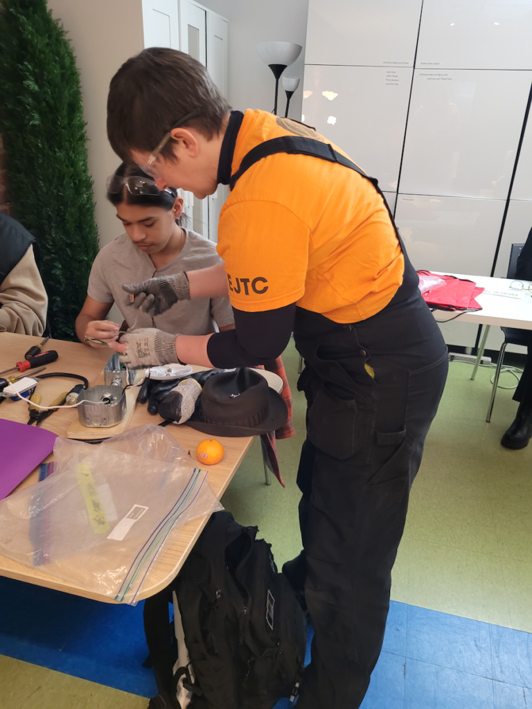 Teresa teaches one-on-one the electrical trade